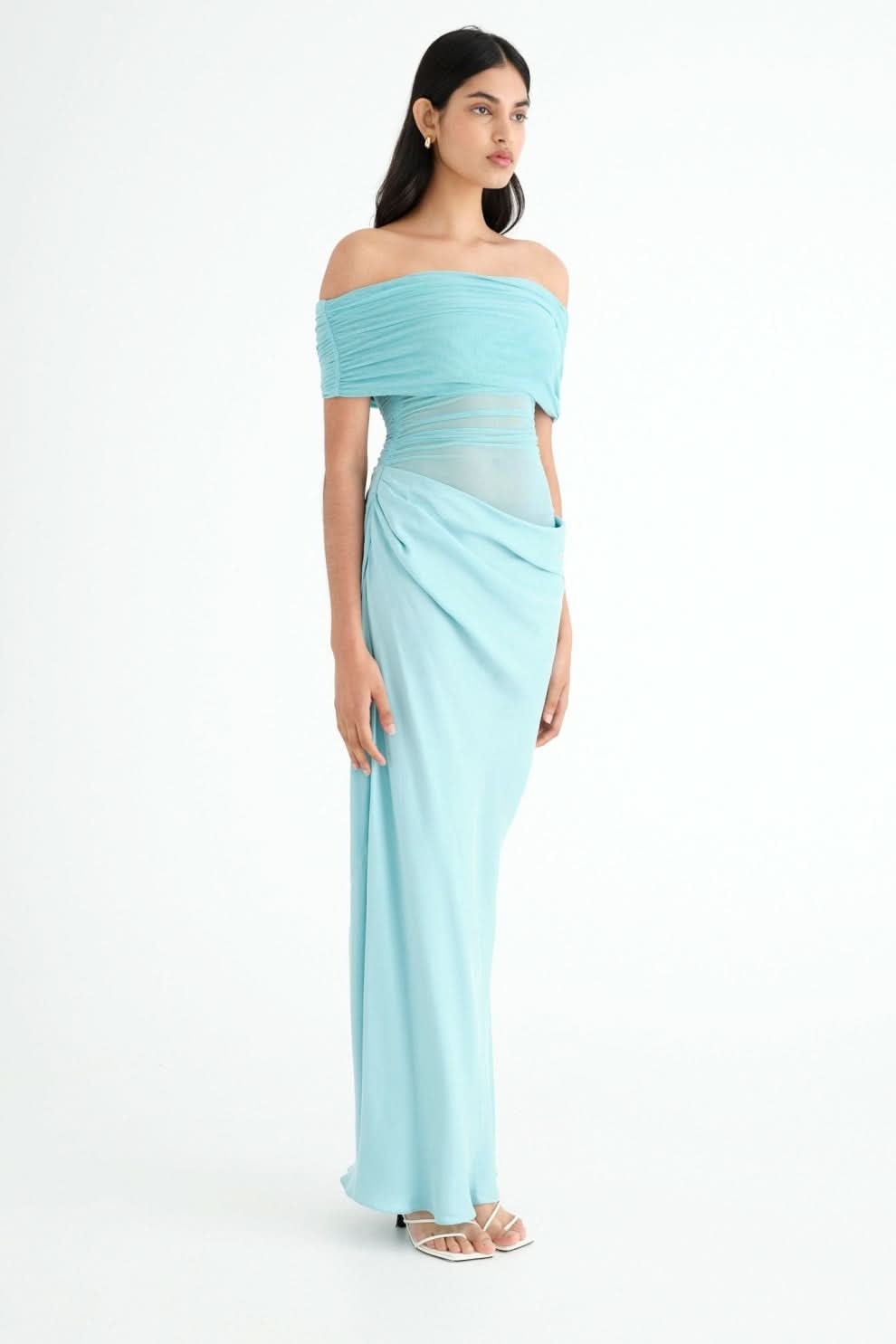 Side view of turquoise ruched maxi dress with off-shoulder neckline