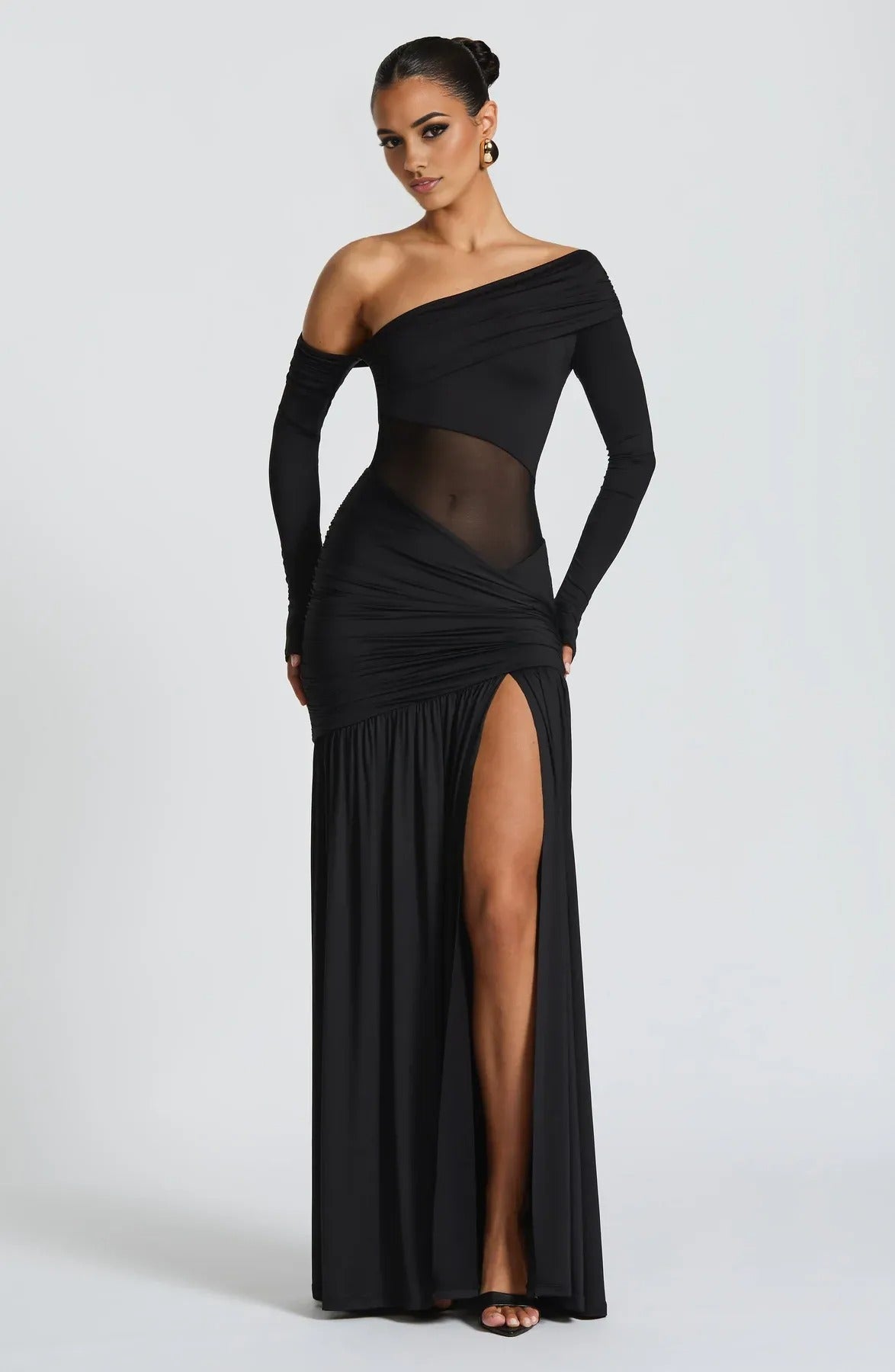 Black ruched maxi dress with off-shoulder neckline and thigh-high slit