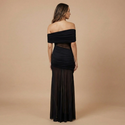 Black ruched off-shoulder maxi dress back view showing sheer mesh panel detail