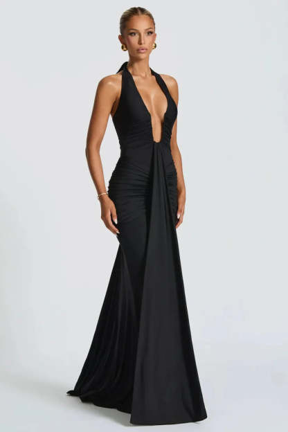 Black halter ruched maxi dress with plunging neckline and flowing train