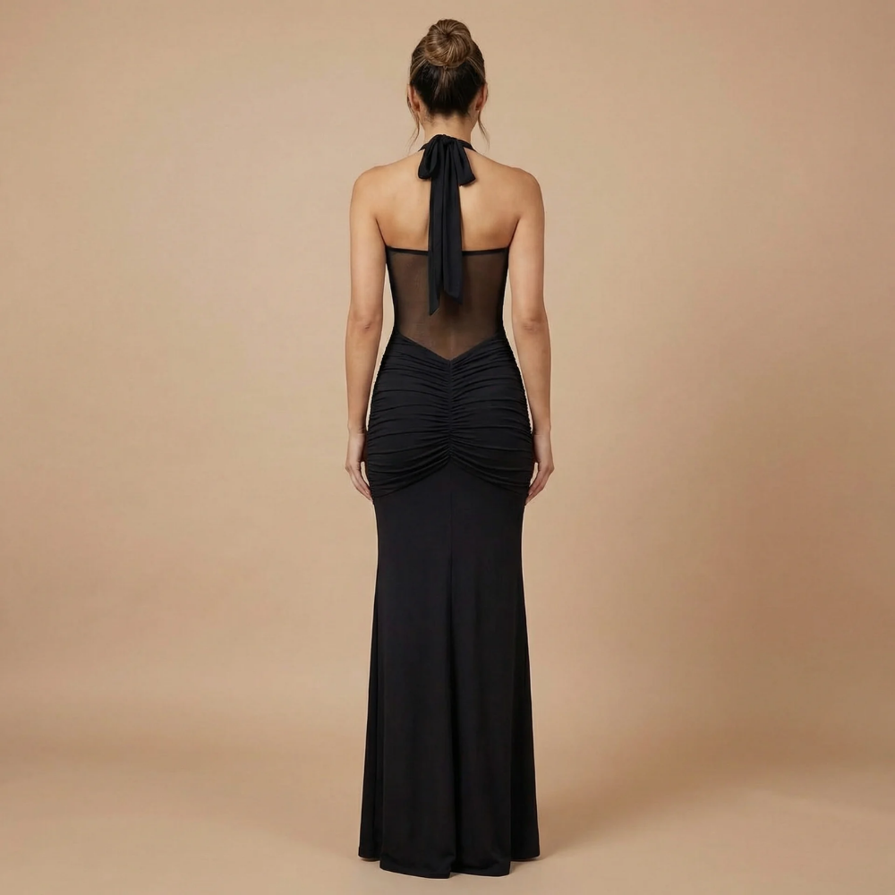 Black ruched maxi dress back view showing halter tie and gathered detail