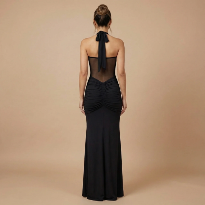 Black ruched maxi dress back view showing halter tie and gathered detail