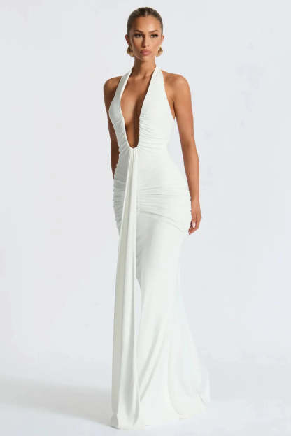 Ivory halter ruched maxi dress with plunging V-neckline and floor length