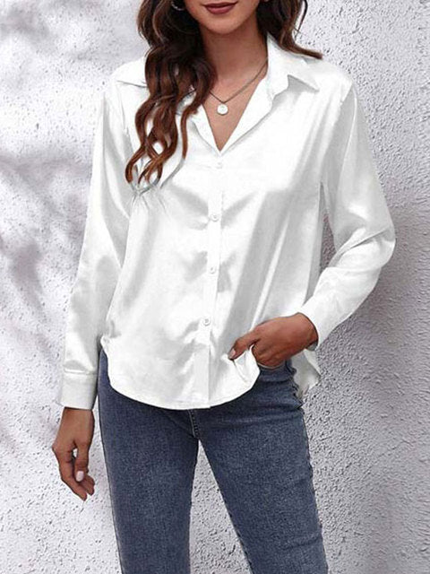 White satin collared top with long sleeves and button closure