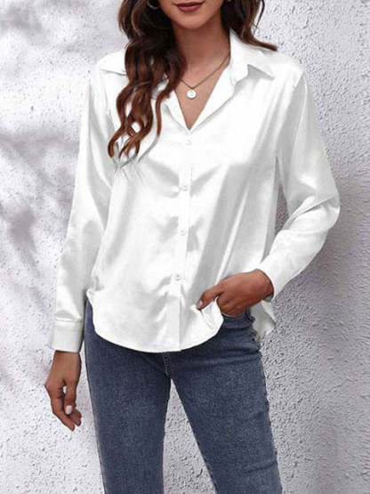 White satin collared top with long sleeves and button closure
