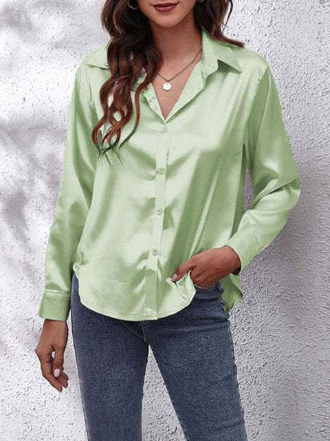 Pale green satin collared top with long sleeves and front buttons