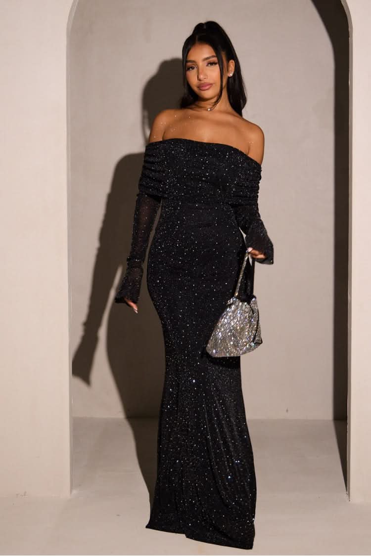 Black sequin off-shoulder maxi dress with long sleeves and fitted silhouette