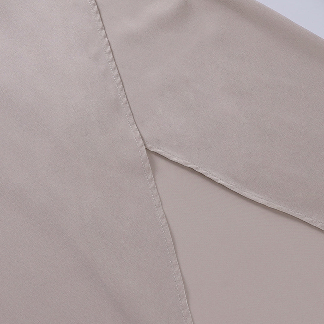 Cream wrap dress wrap closure detail at waist seam