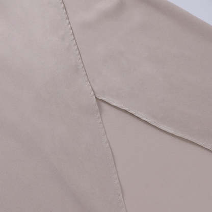 Cream wrap dress wrap closure detail at waist seam