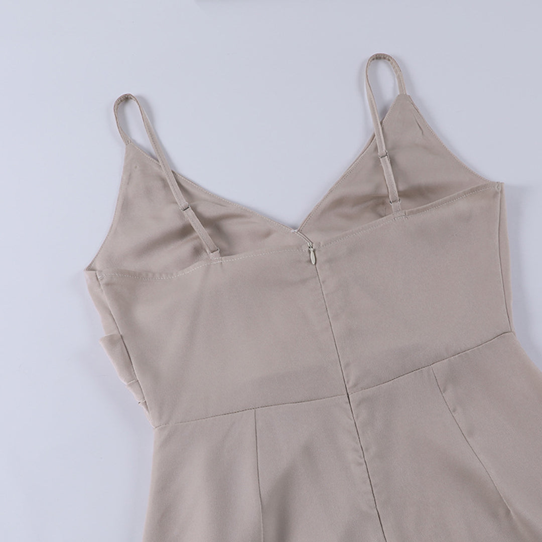 Cream wrap dress back view showing V-neckline and straps