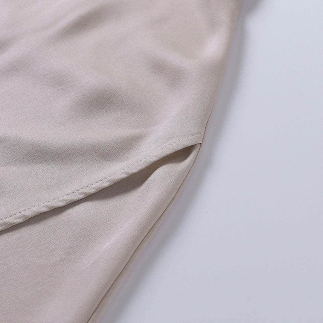 Wrap maxi dress side slit detail showing fabric drape