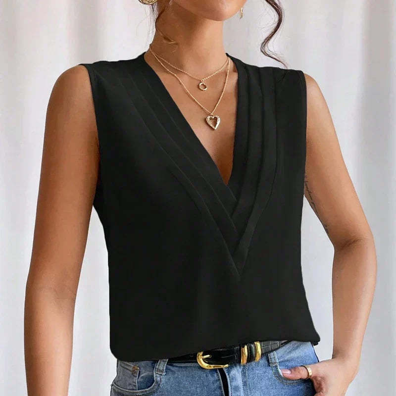 Black sleeveless wrap top with deep V-neckline and draped front
