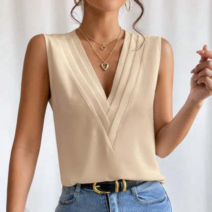 Emerald green sleeveless wrap top with deep V-neckline