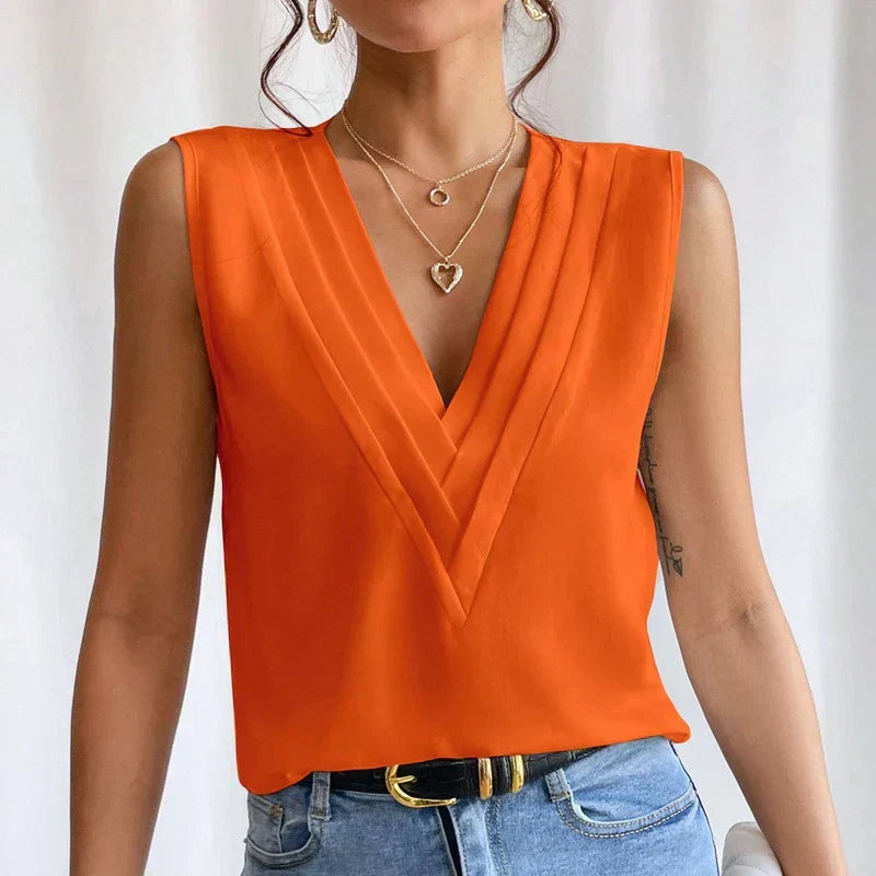 Tangerine wrap top with crossover bodice and sleeveless cut