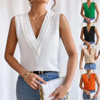 White sleeveless wrap top with deep V-neckline and pleated details
