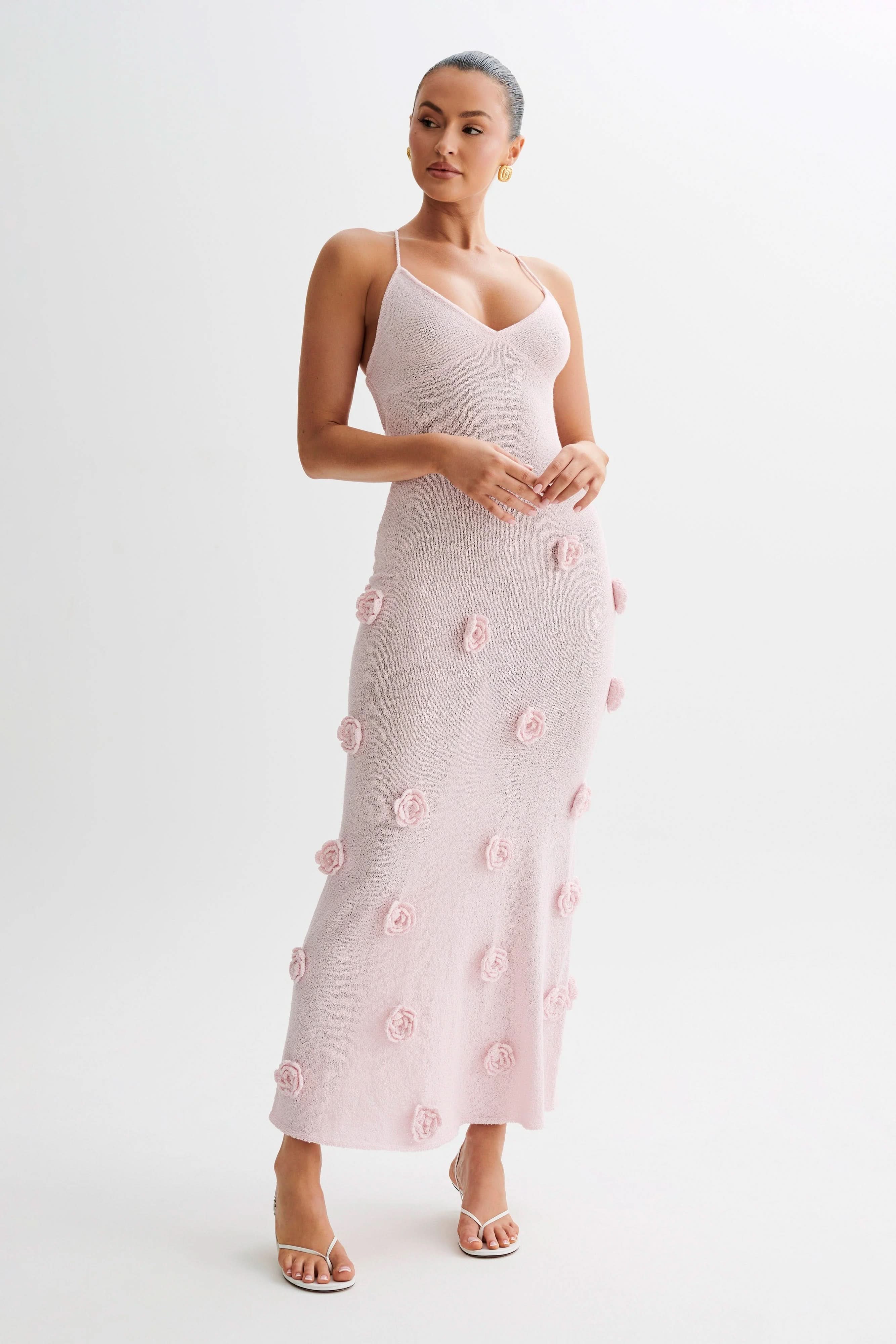 Full-length pink floral maxi dress with textured rose details