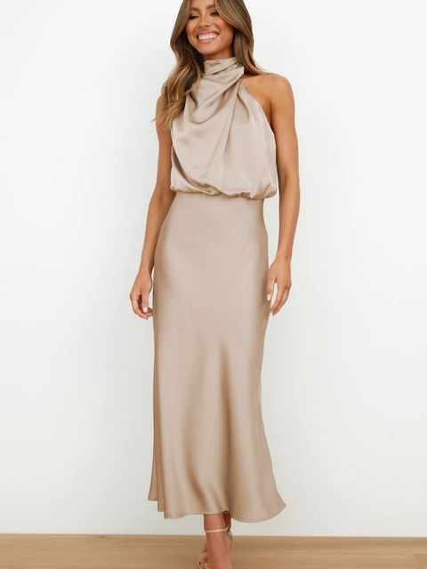 Cream halter draped midi dress with twisted neckline and sleek silhouette