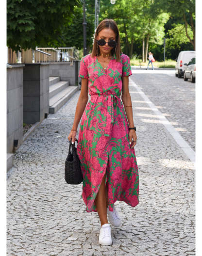 Pink and green botanical print wrap midi dress front view with tie waist