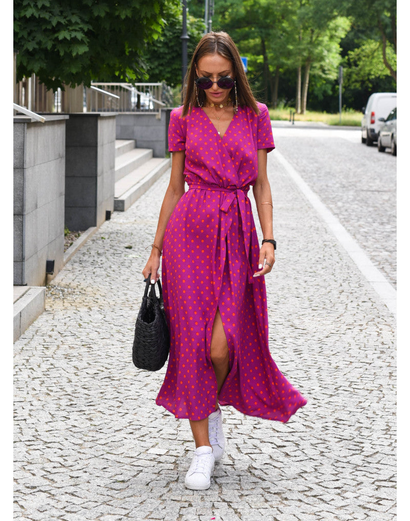 Magenta polka dot wrap midi dress with short sleeves and wrap closure