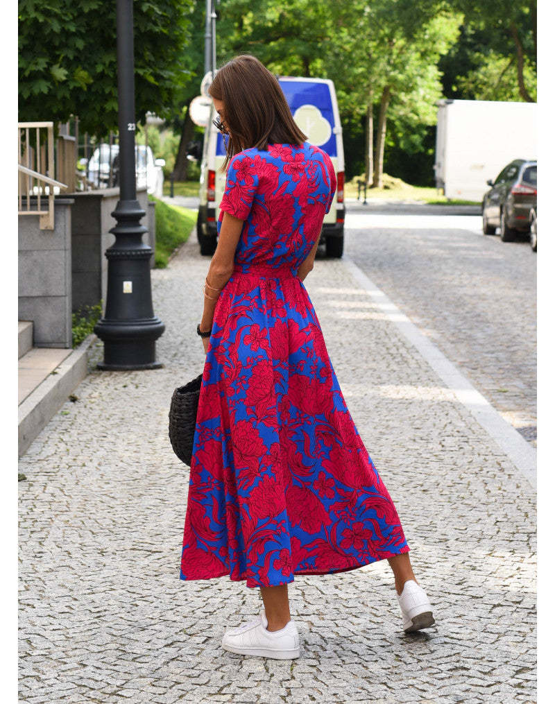 Red and blue floral wrap midi dress back view showing drape and slit