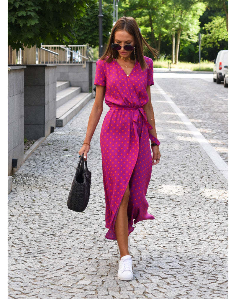 Magenta polka dot wrap midi dress front view with V-neck and wrap tie