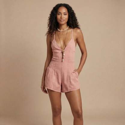Pink denim mini romper with cutout neckline and side pockets for women