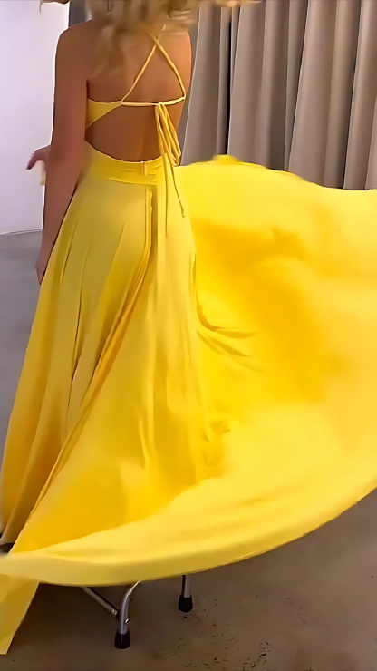 Back view of yellow maxi dress with tie-back detail