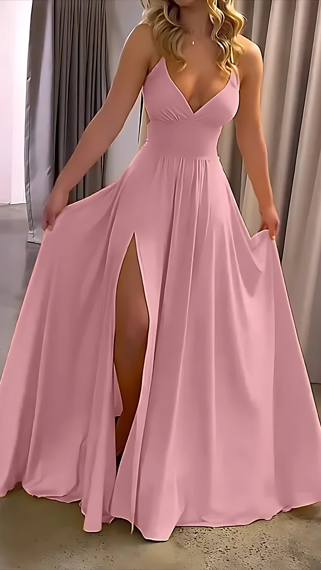 Pink slit maxi dress with V-neckline and flowing silhouette