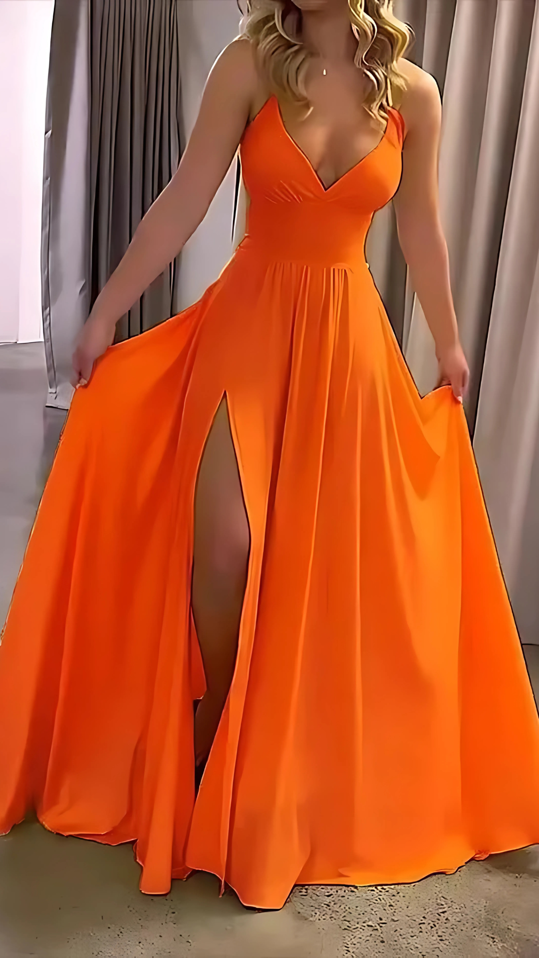 Orange slit maxi dress with V-neckline and high leg opening
