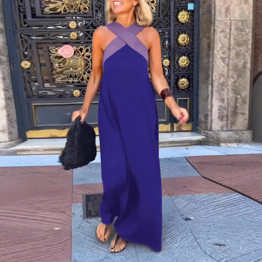 Deep blue maxi dress with lavender crossover straps and asymmetrical hem