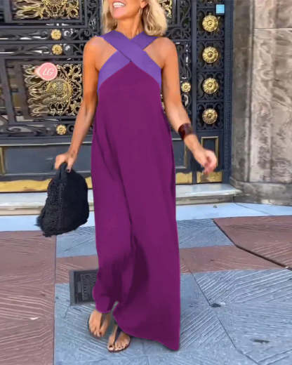 Magenta maxi dress with purple crossover neckline and flowing skirt