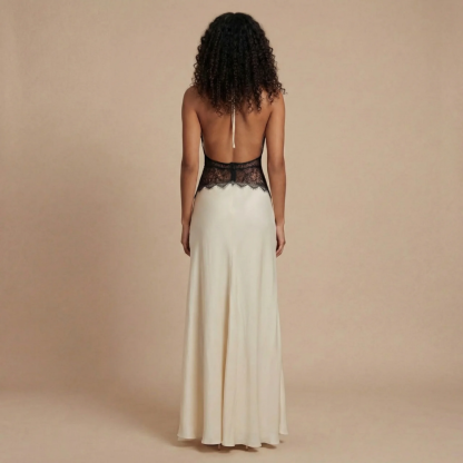 Back view of cream maxi dress showing lace waist and open back