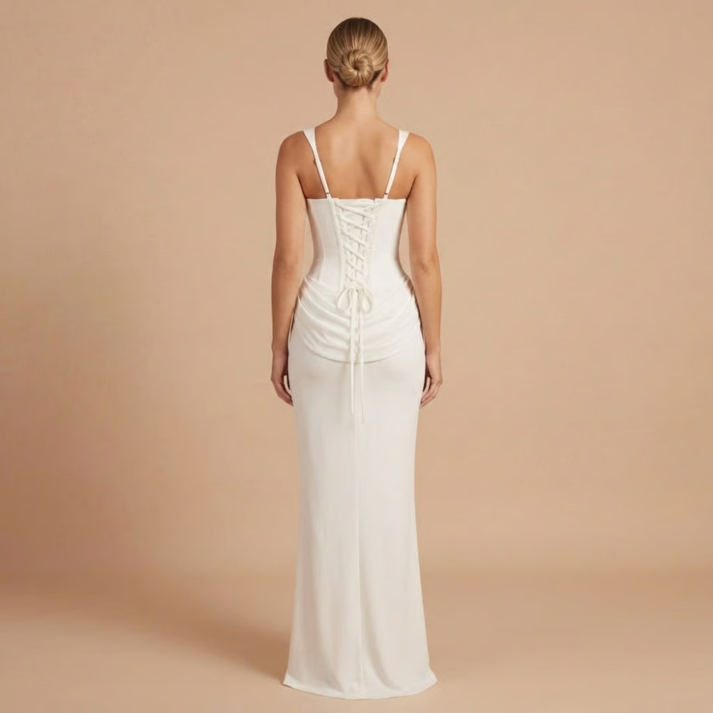 White corset mini dress back view with lace-up corset and thin straps