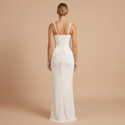 White corset mini dress back view with lace-up corset and thin straps