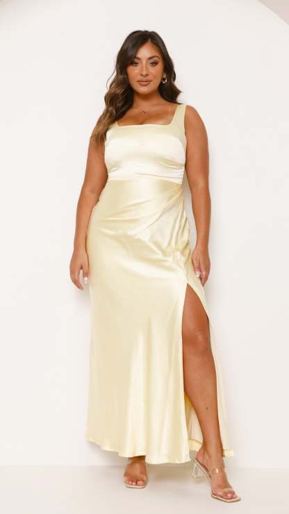 Cream ruched maxi dress with gathered waist and high leg slit