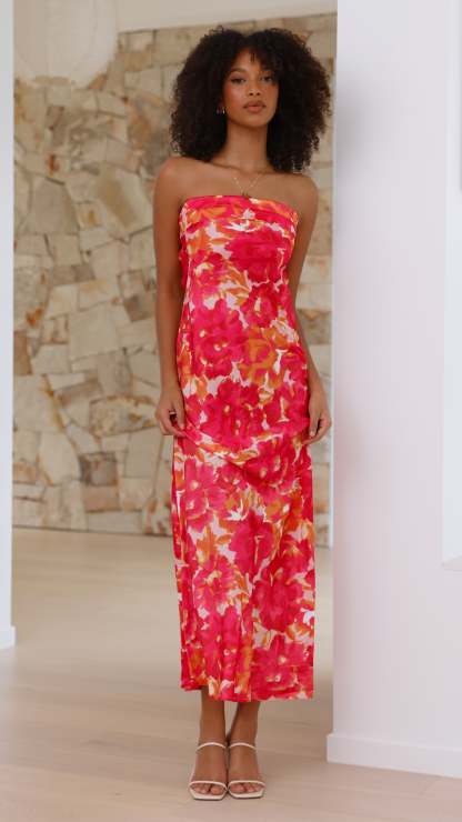 Front view of pink floral strapless midi dress with gathered bodice detail