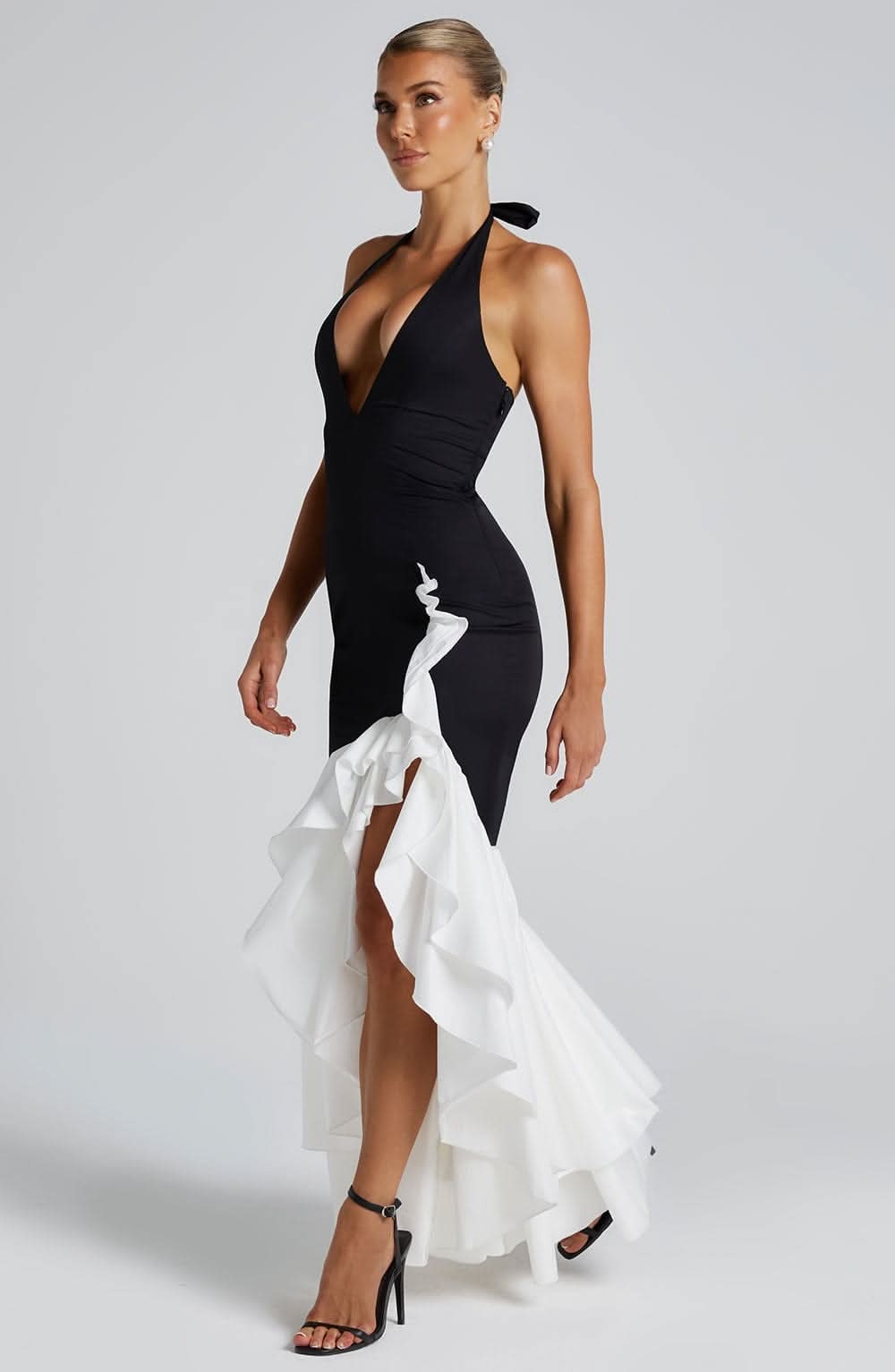 Black and white halter ruffle maxi dress front detail with deep V-neckline