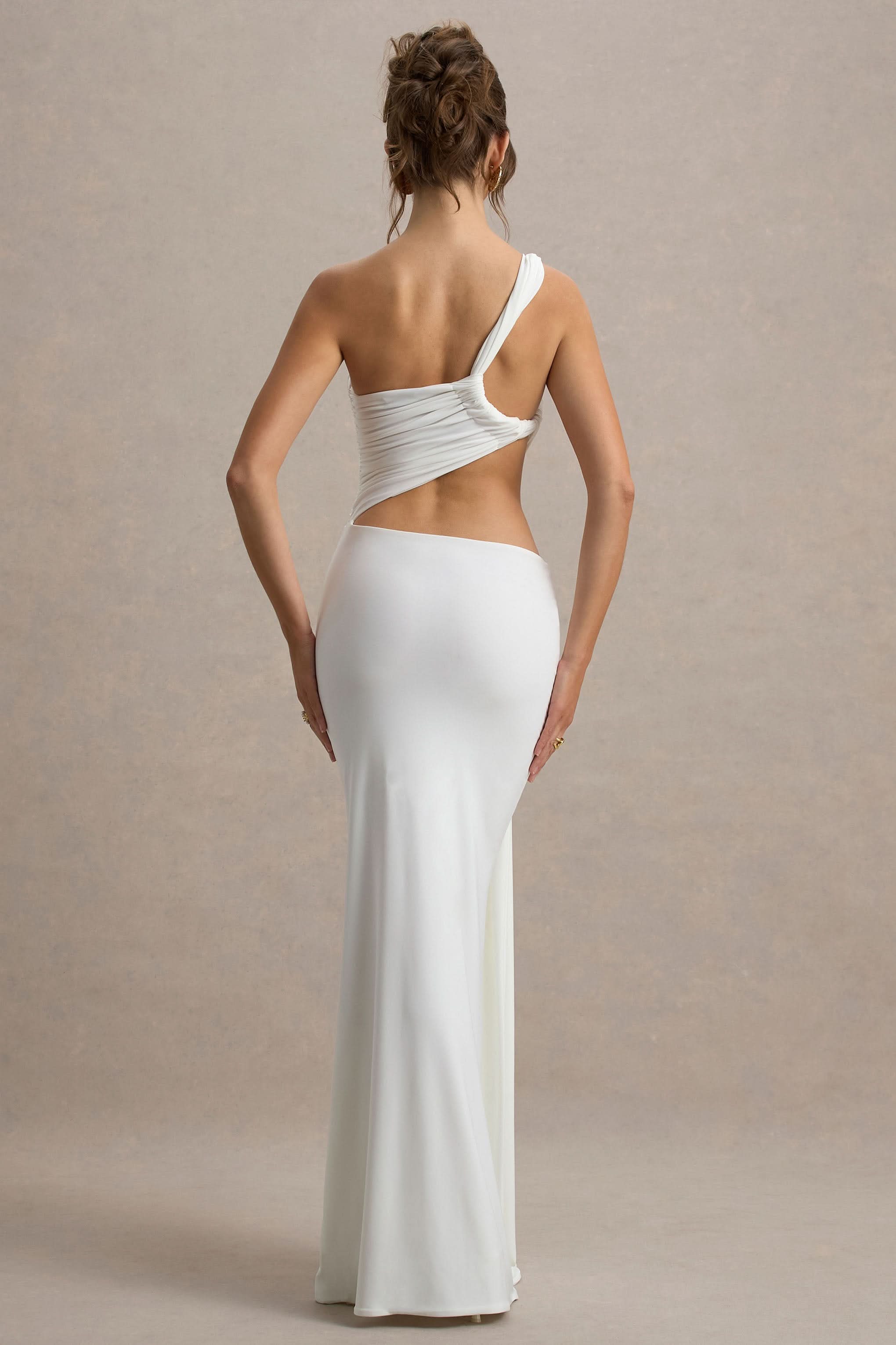 White cutout maxi dress back view with asymmetrical strap design