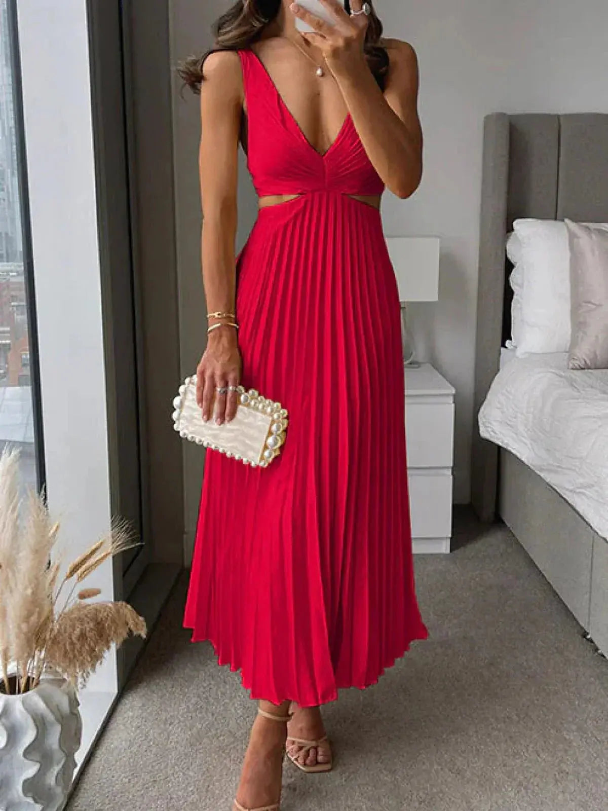 Red pleated cutout midi dress with V-neck and waist cutout design