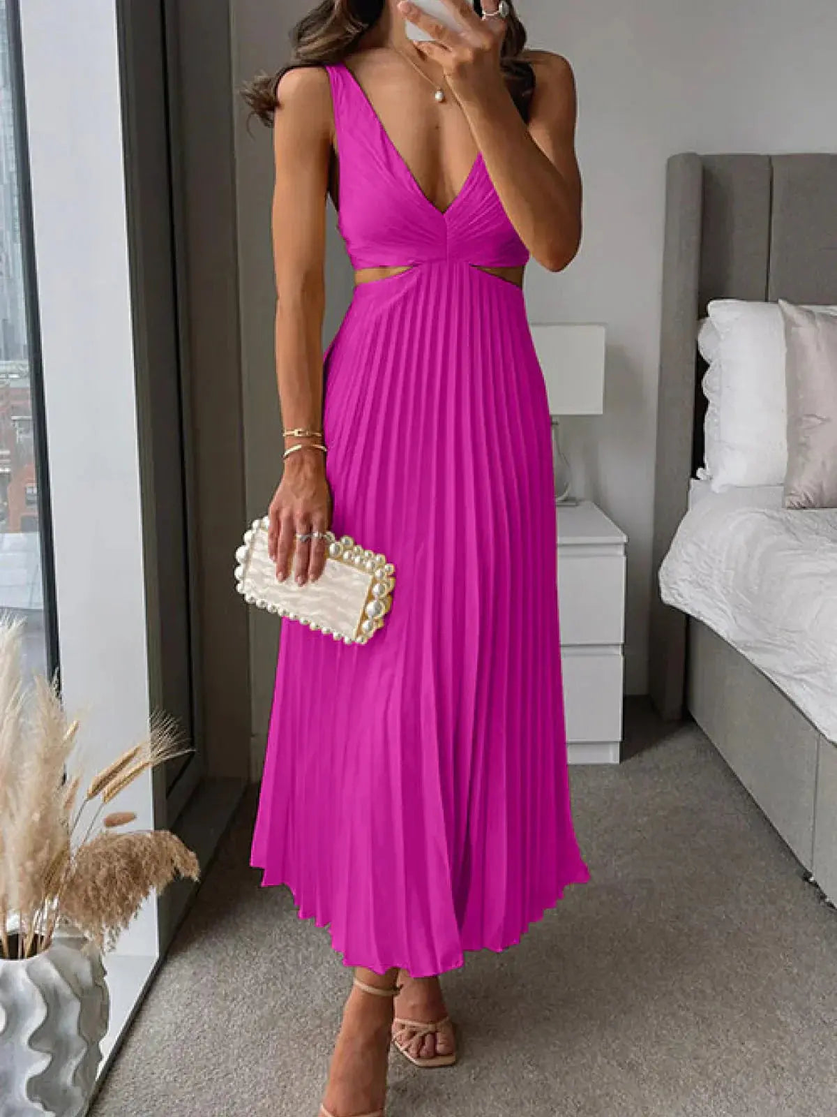 Magenta pleated cutout midi dress with deep V-neckline and side cutout
