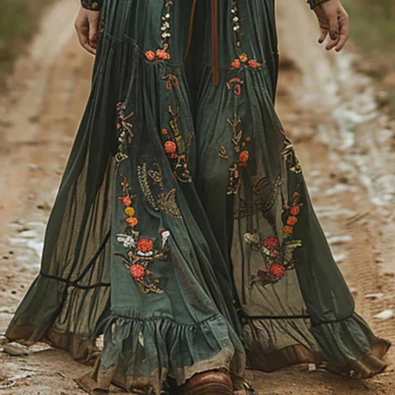 Embroidered floral maxi skirt with tiered ruffled hem and pleated construction