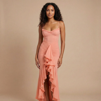 Coral ruched maxi dress with sweetheart neckline and ruffled high-low asymmetrical skirt