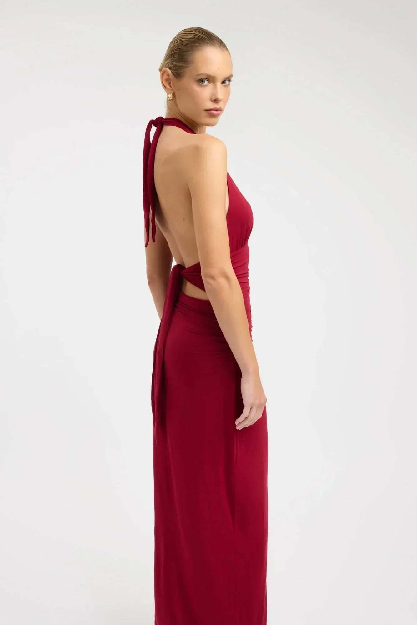 Burgundy halter maxi dress with open back and ruched waist detail