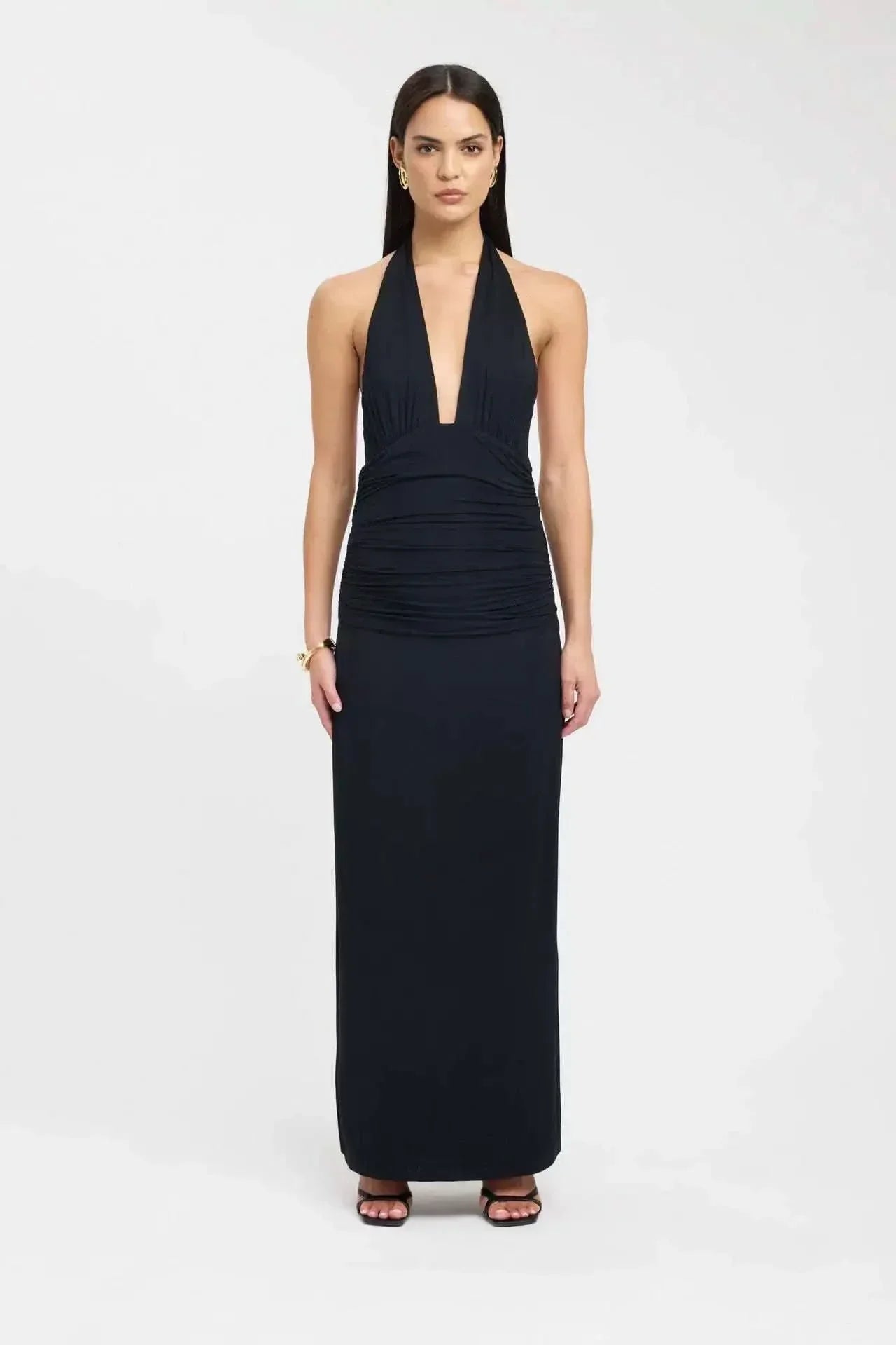 Black halter maxi dress with plunging neckline and ruched bodice
