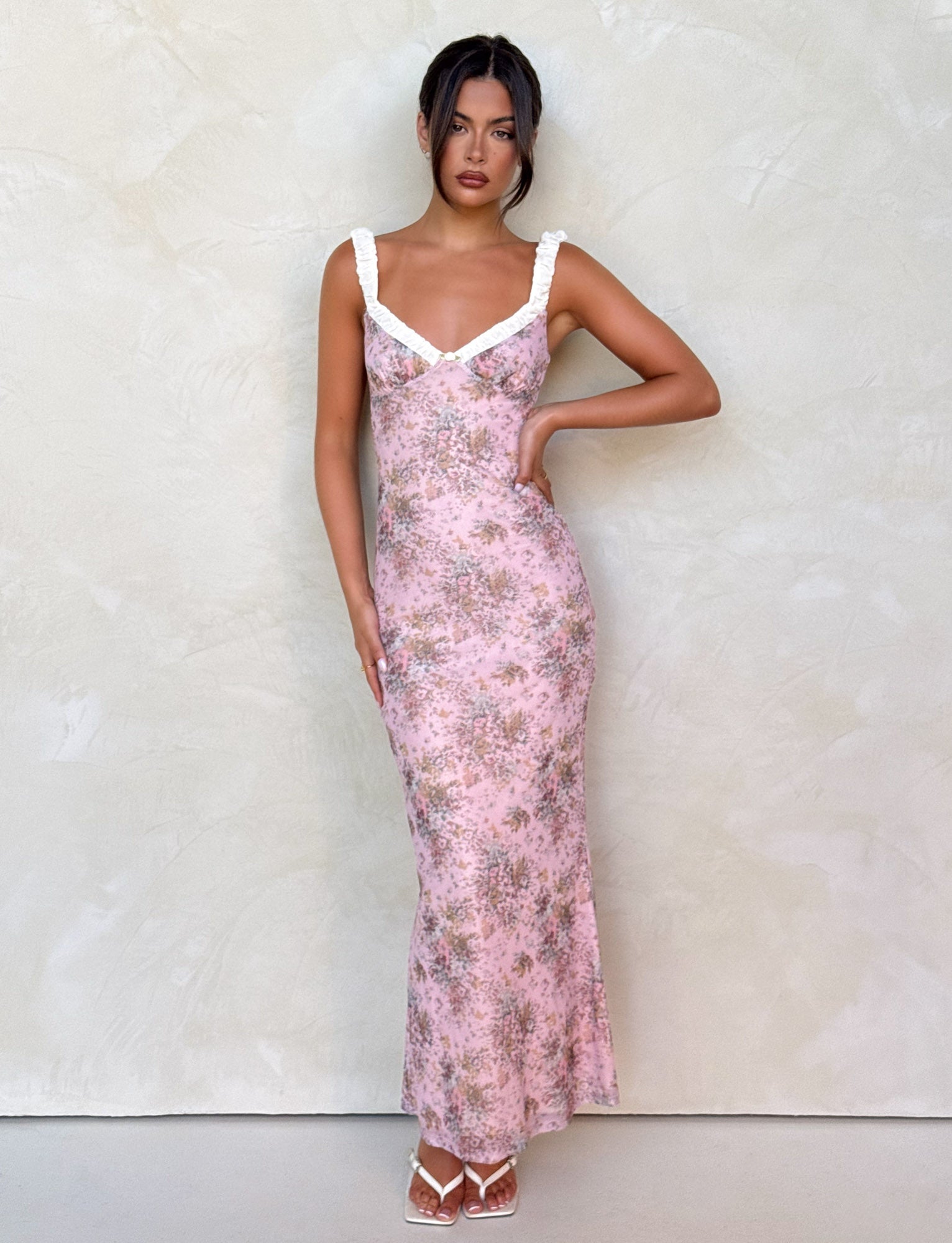Pink floral ruched maxi dress with white sweetheart neckline and straps