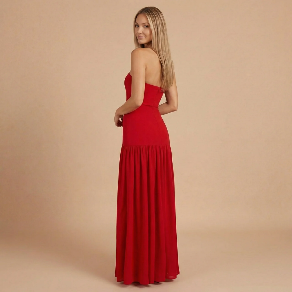 Back view of red bandeau maxi dress with gathered skirt detail