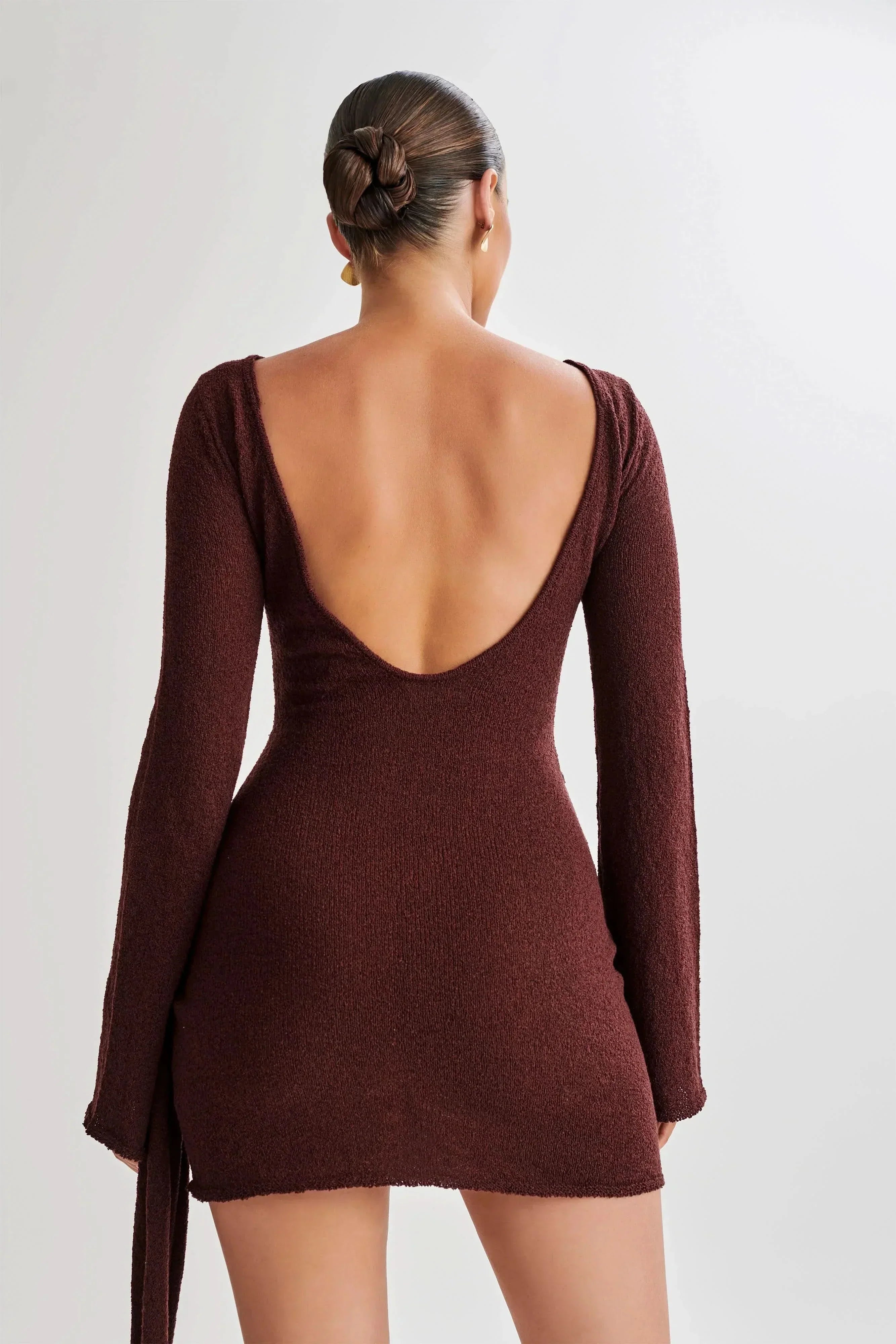 Burgundy wrap mini dress back view with open back and tie detail