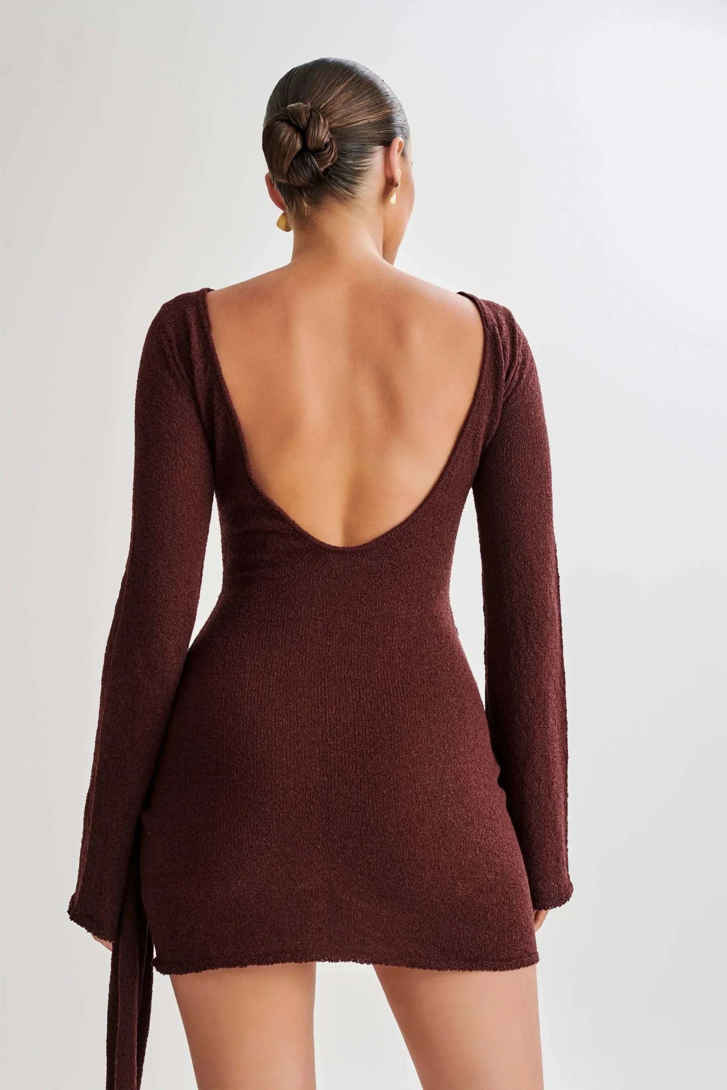 Burgundy wrap mini dress back view with open back and tie detail