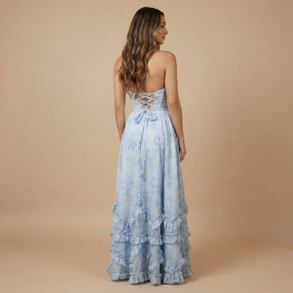 Back view of light blue floral halter dress with lace-up corset detail