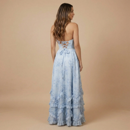 Back view of light blue floral halter dress with lace-up corset detail